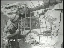 1944: BATTLE OF KWAJALEIN:  VS U.S. 4th Marine Division soldiers checking rubble of bombed Japanese blockhouses, defensive structures. VS Combat artists drawing sketches of block houses in sketchpad. World War II, WWII, Pacific Front Instructional Video