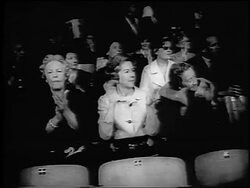 B/W 1965 group of senior women clapping in audience at World Figure Skating Championships / Colorado Stock Footage
