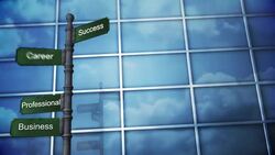 Clouds are reflected in a glass building behind a shifting signpost of business terms. Stock Footage