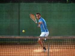 HD Super Slow-Mo: Playing Tennis On The Clay Court Stock Footage
