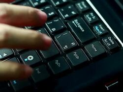 Typing fingers push notebook.Enter Stock Footage