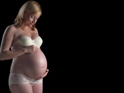 HD: Pregnant Woman Touching Her Belly Stock Footage