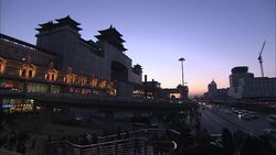 Pedestrians climb steps near the Beijing West Railway Station. Stock Footage
