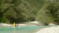 HD: Whitewater Kayaker Rolling Down The River Stock Footage