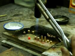 HD:Goldsmith working with a unfinished work. Stock Footage