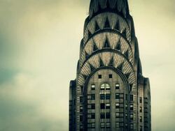 Clouds roll behind the tower of the Chryster Building in New York City. Stock Footage