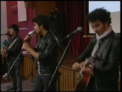 The Jonas Brothers visit a UK school News Clip