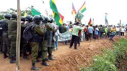 CLEAN: Bolivia: activists force minister into protest march News Clip