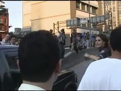 2003 blackout, police making way for cars in crowd Stock Footage