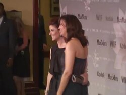 Debra Messing (left) at the 2010 Women In Film Crystal & Lucy Awards: A New Era at Los Angeles CA. (Footage by WireImage Video/GettyImages) Stock Footage