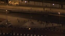 Night shots of ongoing skirmishes in Tahrir Square area Instructional Video