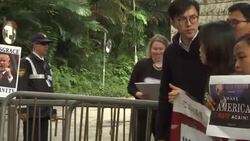 Dozens march in Hong Kong against US travel ban News Clip