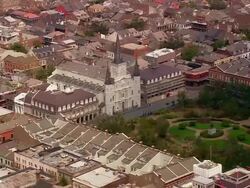 Aerial over Saint Louis Cathedral and Jackson Square in the French Quarter / New Orleans, Louisiana Stock Footage