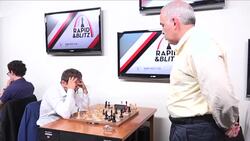 CLEAN : Chess: Kasparov suffers first loss in comeback event News Clip