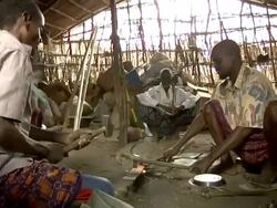 Man forging piece of metal Stock Footage