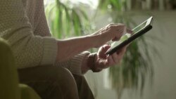 Tablet mature hands Stock Footage