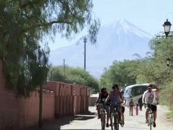 MS View of People and cars moving in san Pedro street with mountain / Angostura, Chile Stock Footage