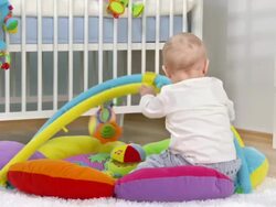 HD DOLLY: Baby Boy Playing On The Playmate Stock Footage