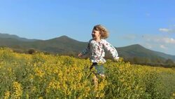 HD Super Slow-Mo: Little Girl Running Through Field Stock Footage