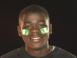 Smiling Patriotic Nigeria male - HD &amp; PAL Stock Footage