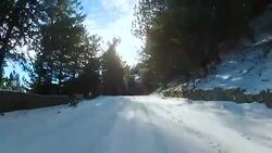 highway through a forest in winter, GoPro Stock Footage