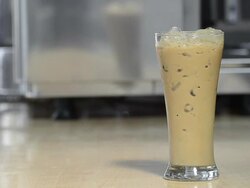 Pouring Iced Coffee Stock Footage