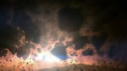 A massive explosion sends debris and fiery rocks streaming to earth where it kills dinosaurs in a computer generated animation. Stock Footage