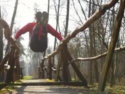 HD DOLLY: Body Building Exercises On A Footbridge Stock Footage