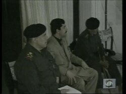 GWT: Iraqi TV shows Saddam and son meeting commander News Clip
