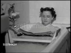Teenage girl in bathroom bubble bath Instructional Video