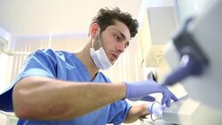 Young dentist working Stock Footage