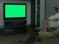 Man watches TV Stock Footage