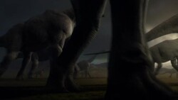 Herbaceous dinosaurs migrate across a wide plain in a computer generated animation. Stock Footage