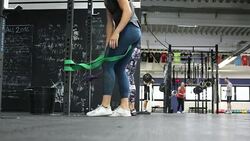 Women exercising with resistance bands in gym Stock Footage