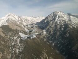 TS 4 F-16 fighter jets flying in formation in front mountains, Colorado Rockies, Colorado, USA Stock Footage
