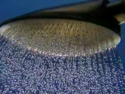 High Speed water drops fall from watering can Stock Footage