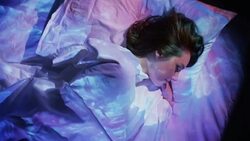 High angle close up of projections on sleeping woman / Cedar Hills, Utah, United States Stock Footage