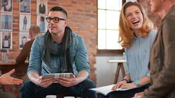 Asian man introducing the project to coworker in meeting Stock Footage