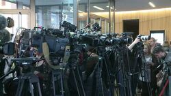 CLEAN : German minister resigns over MP 'probe lea News Clip