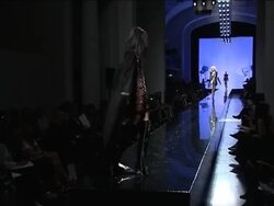 Mickey Rourke and Kylie front row at Gaultier's Hollywood inspired show News Clip