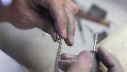 Jeweler manufactures necklace Stock Footage
