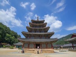 Shot of Palsangjeon(wooden pagoda, Korea National Treasure 55, Joseon) and clouds against blue sky in Beopjusa(temple) Stock Footage