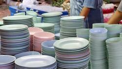 Cleaning dish with towel Stock Footage