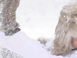 HD SUPER SLOW-MO: Snowballs Hitting Woman Stock Footage