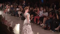 CLEAN : Down teen and bionic model walk at NY fashion week News Clip