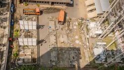 HD Time-lapse: Aerial view of working peoplein electrical Construction site Stock Footage