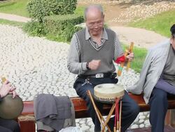 MS People play Traditional musical instruments in park/xian,shaanxi,China Stock Footage