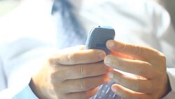 Close up of a man using mobile phone Stock Footage