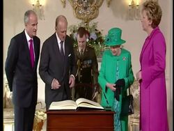 The Queen signs Visitors Book News Clip