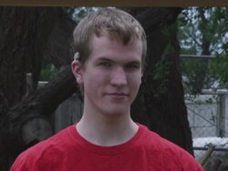 Static shot of a deaf young man wearing a hearing aid Stock Footage